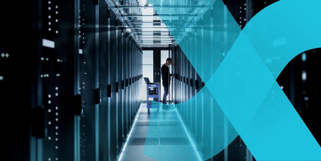 Person working in a server room, this is overlayed by a Blue X.